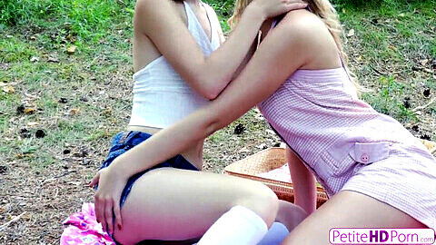 Petite lesbian teens discover the taste of pussy is better outdoors!