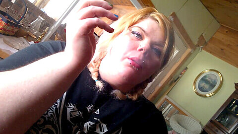 Smoking hot blonde with dual braids satisfies her smoking fetish