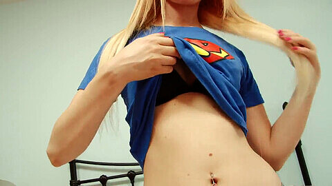 Sensual Supergirl seduces with her luscious lips and perky breasts