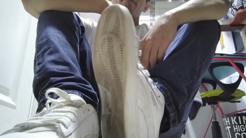 Mexican guy in Puma sneakers and blue socks reveals his filthy size 9.5 soles for foot fetish lovers