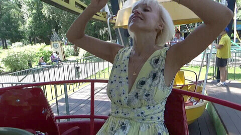 Public park pussy exhibition and solo play on Ferris wheel by attractive young blonde