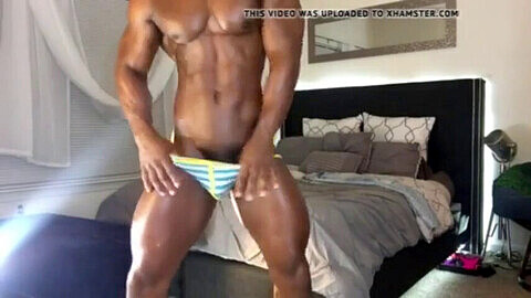 Horny black muscle dude stretches his tight hole in amazing ways