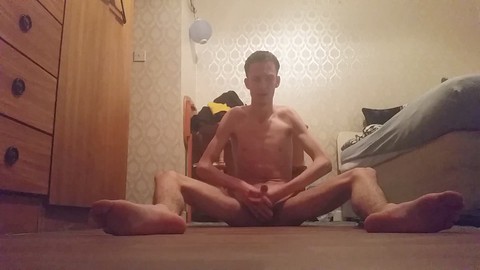 Skinny teen jerks off his huge hard cock on bedroom floor