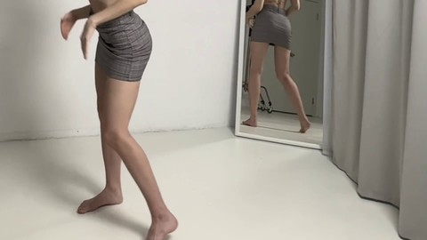Gorgeous giantess showcases her sensual yoga skills in revealing skirts