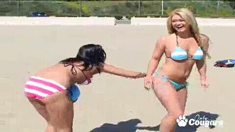 Busty blonde Brooke Cherry and her lesbian squad indulge in a naughty beach day