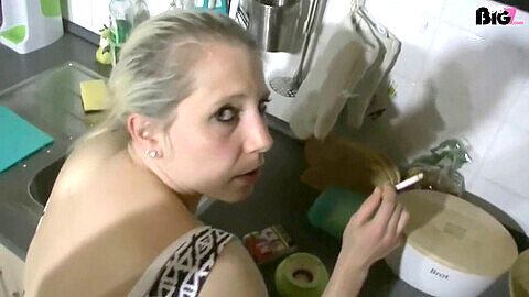 German smoking babe gets pounded in the kitchen