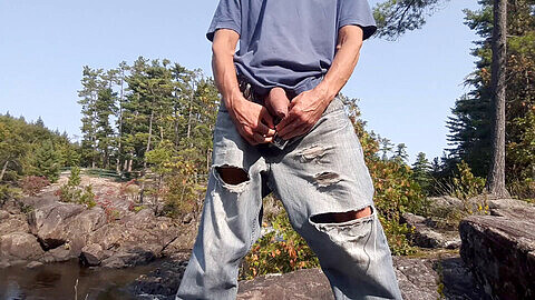 Public edging on a rock in my denim, with uncut cock and foreskin play