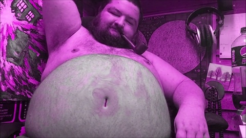 Chubby gay man indulges in his belly fetish with bloating and kink play