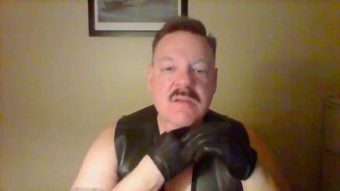 Leather-clad bears indulge in domination & submission with gloves, chaps, and cigars - featuring dannoinjax