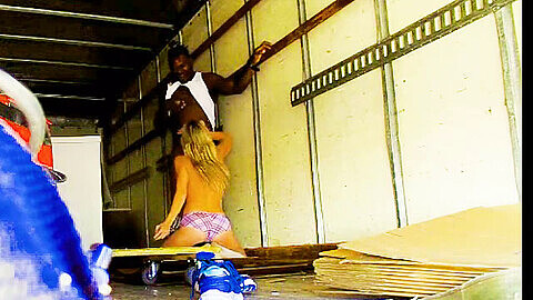 Busty blonde MILF gets pounded by a hung black stud in the back of a truck
