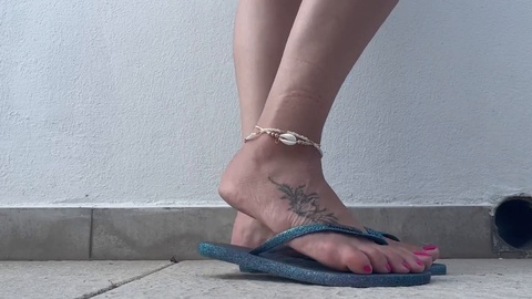 Dirty flip flops and barely muddy feet for foot worship enthusiasts
