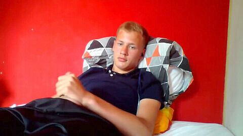 18-year-old Danish guy in t-shirt and shorts enjoys a threesome with two guys on cam!