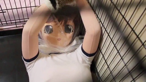 Kigurumi pup trapped in a box experiments with bondage and breathplay
