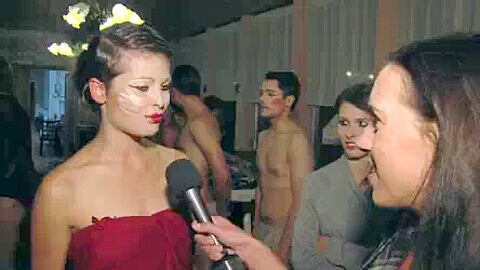 Naked reporter on tv, runway, amsterdam naked fashion show