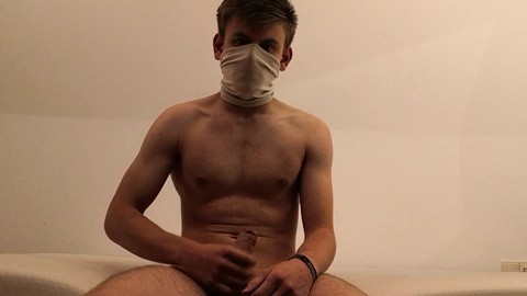 Curious and hooded teenage boy explores solo masturbation for the first time