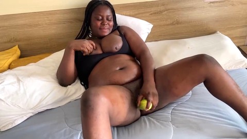 Pregnant ebony woman africanbestsex007 enjoys solo play with a huge cucumber
