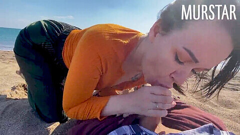 Toma Mur gives a beach blowjob in public