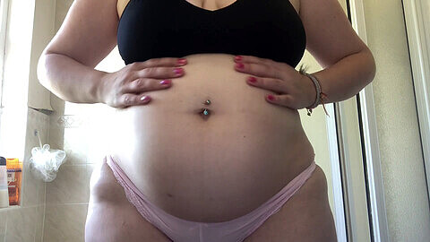 Chubby belly, round, belly piercing