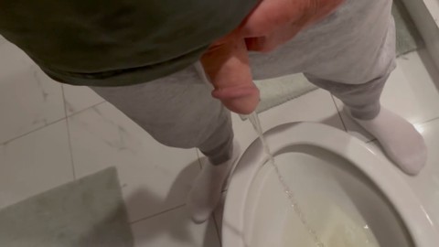 Guy pissing, close up, gay male pissing