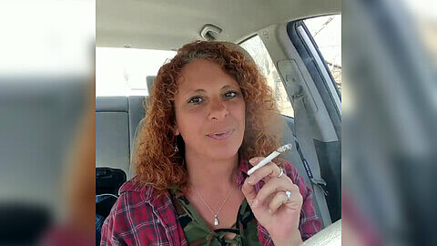 Sultry redhead wife indulging in her smoking fetish