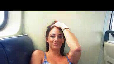 Beautiful Bella pleasures herself with a magic wand on the train, showing off her stunning face and body to the public